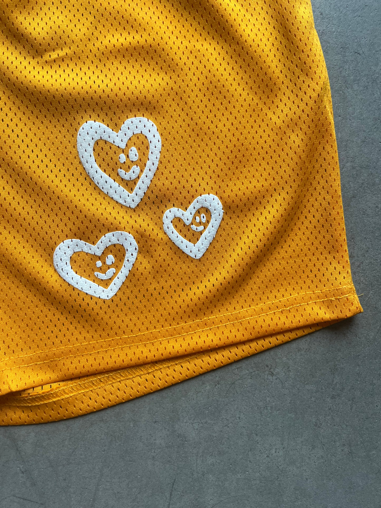 SMILEY HEART MESH SHORTS